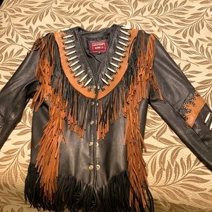 Ladies small soft black & Brown leather jacket with fringes. Like new.